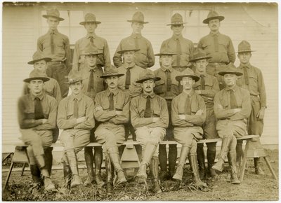 Group of Seventeen Uniformed Soldiers Posing for a Group Picture by Carl Michel